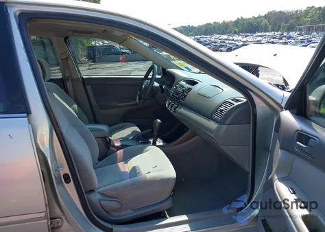 2003 Toyota Camry Le from USA, damaged, VIN 4T1BE32K13U166479